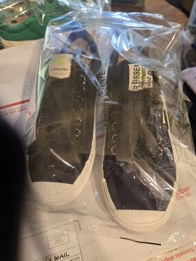 Cariuma Men's Black Canvas Slip-On Sneakers with White Soles
